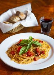 Andreoli Italian Grocer signature dishes Porchetta SandwichLasagnaSpaghetti alla Bottarga﻿﻿